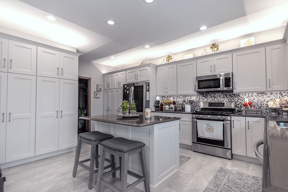 remodeled kitchen with off-white cabinets
