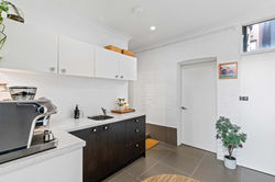 Kitchen and rear entry.