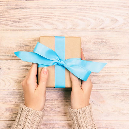 woman-hands-give-wrapped-valentine-or-ot