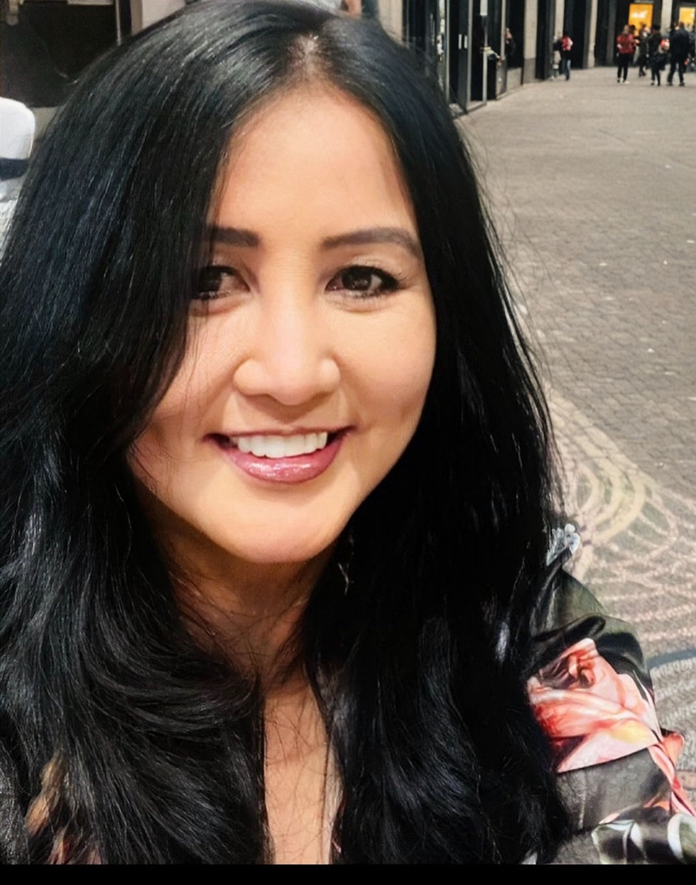 Smiling woman with long black hair