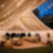 beautiful white backyard tent with string lighting .jpg