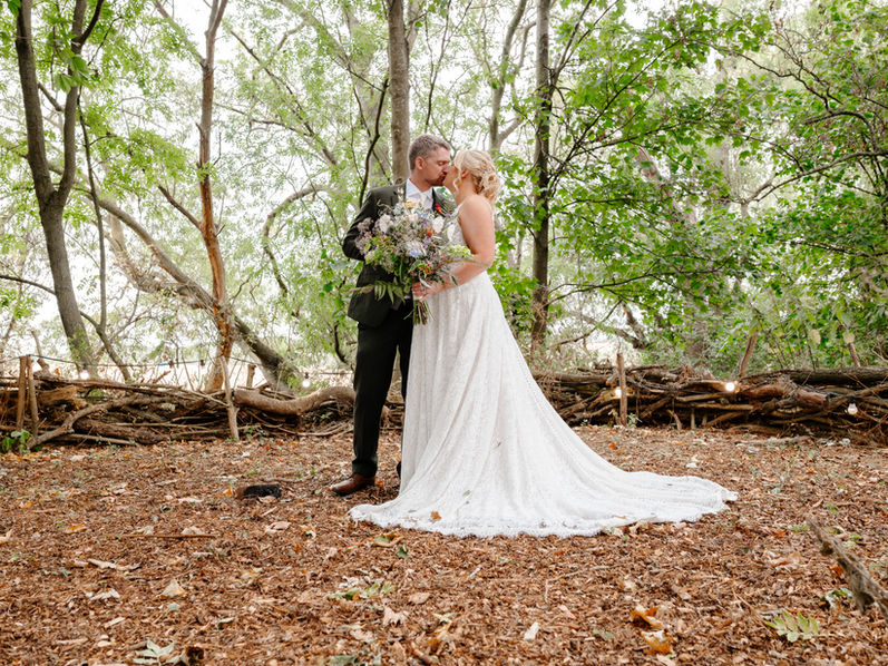 Couple kissing in woods, LP WEDDING PHOTOGRAPHY