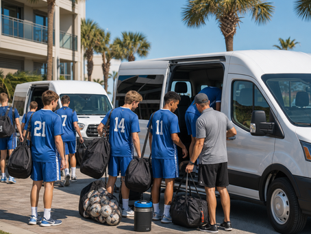 Youth and adult sports teams loading equipment and boarding 15‑passenger shuttles at a Myrtle Beach sports complex for tournaments and athletic events along the Grand Strand.