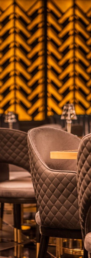 A close up of the interior design and created by SANTI Design House. A maximalist design featuring tones from the 1920's to give it a retro yet modern feel.