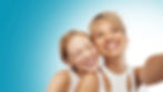 Two happy patients smiling.