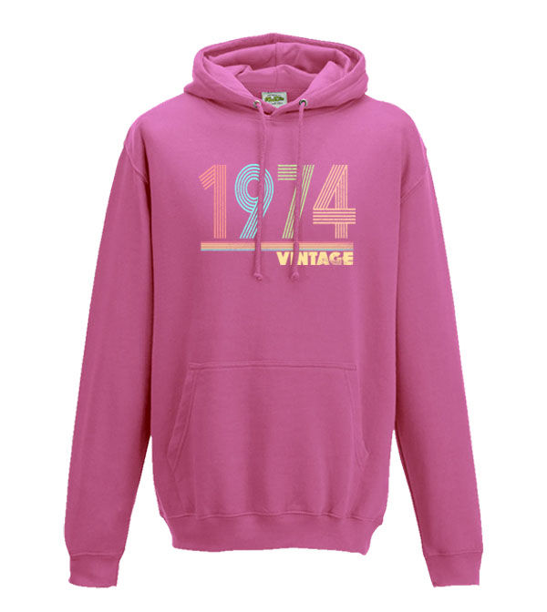 Thumbnail: 1974 in a multicoloured distressed line font with the word vintage underneath on a pink hoodie