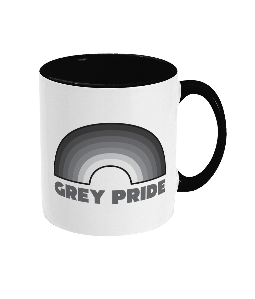 A rainbow made of different shades of grey with the words grey pride written beneath printed onto a black and white mug