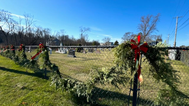Garland wrapped around a cemetery