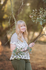 High school senior photographed by Kristina Martin Photography, Sacramento and Roseville senior photographer, in long golden grass during golden hour with soft, wispy light and warm neutral tones.