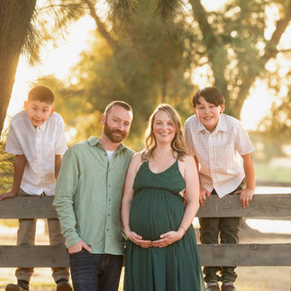 Maternity session at Sacramento ranch at sunset with two young boys captured by best maternity photographer in Sacramento, Kristina Martin.