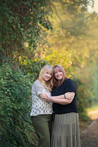 High school senior photographed by Kristina Martin Photography, Sacramento and Roseville senior photographer, in long golden grass during golden hour with soft, wispy light and warm neutral tones.