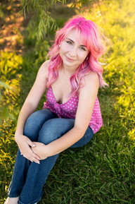 Sacramento senior photographer capturing a golden hour lavender farm senior session with wildflowers, willow trees, dock portraits, and natural personality-filled senior photos.