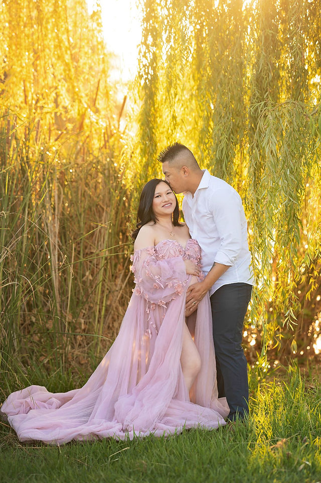 Best Sacramento maternity photographer captures Shirley’s maternity session at Bywater Hollow Lavender Farm in a pearl gown and mauve tulle gown.