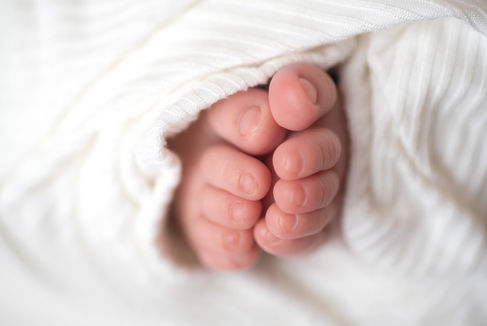 In home newborn session by Sacramento Best Portrait Photographer Kristina Martin Photography.