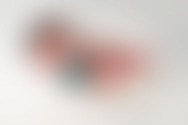 A gallery of newborn session images featuring a swaddled baby in simple, cozy setups. The photos capture a variety of angles, showing the baby peacefully resting in natural, comfortable poses. Some images are taken on a soft white backdrop, while others include a blue background or warm, textured blankets taken by Sacramento Maternity and Newborn photographer Kristina Martin Photography.