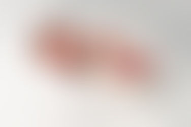 A gallery of newborn session images featuring a swaddled baby in simple, cozy setups. The photos capture a variety of angles, showing the baby peacefully resting in natural, comfortable poses. Some images are taken on a soft white backdrop, while others include a blue background or warm, textured blankets taken by Sacramento Maternity and Newborn photographer Kristina Martin Photography.
