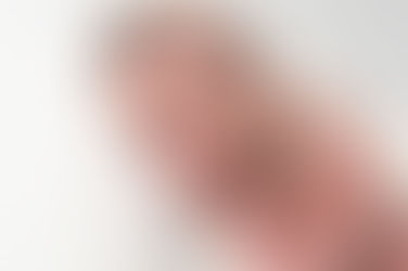 A gallery of newborn session images featuring a swaddled baby in simple, cozy setups. The photos capture a variety of angles, showing the baby peacefully resting in natural, comfortable poses. Some images are taken on a soft white backdrop, while others include a blue background or warm, textured blankets taken by Sacramento Maternity and Newborn photographer Kristina Martin Photography.