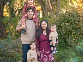 Family of five with three young children during a downtown Sacramento family photography session near the Sacramento Zoo.