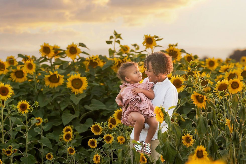 Family session in the sunflower fields with the best Sacramento Family Photographer Kristina Martin