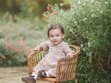 Family photography session in Roseville, California during early morning light featuring parents and their one-year-old daughter captured by Kristina Martin Photography, best Sacramento family photographer.