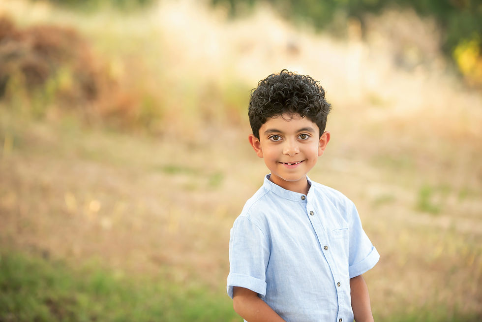 Family session over looking the Sacramento River taken by Sacramento Family Photographer Kristina Martin