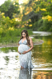 Maternity image of mom-to-be standing in the water during her maternity session in Sacramento Ca taken by the best Sacramento Maternity Photographer Kristina Martin