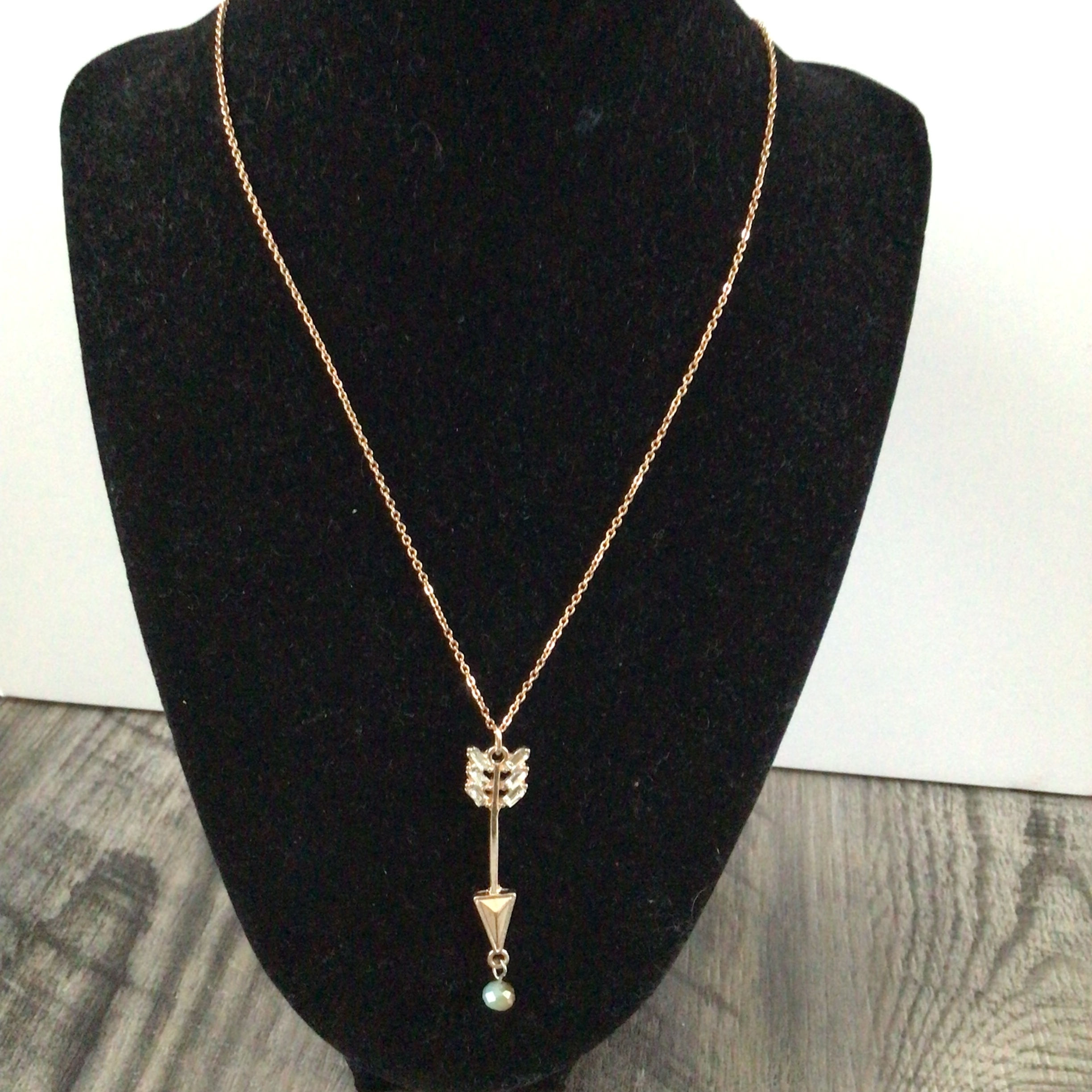 Rose gold chain with arrow pendant