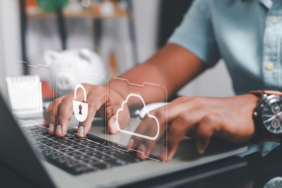 man typing on laptop with a chart, lock, and cloud above the keyboard
