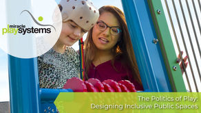 A child wearing a protective helmet explores a playground activity panel with the support of an adult, highlighting inclusive play and shared learning experiences.