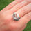 Thumbnail: Silver Ring with Green Gemstone and Diamante. Pretty Ribbon Bow Shaped.