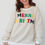 Thumbnail: White MERRY CHRISTMAS Multicolor Embroidered Sherpa Pullover Sweatshirt