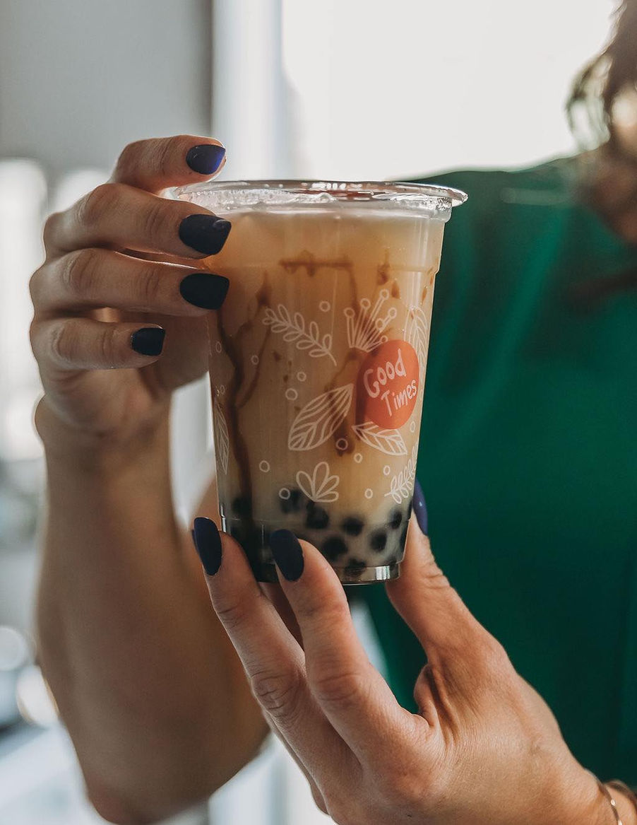 SSC Emily Holding Drink (no mark).jpeg