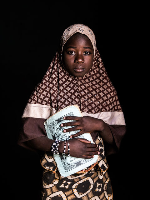 One Day I Will, a child dressed up as a teacher.