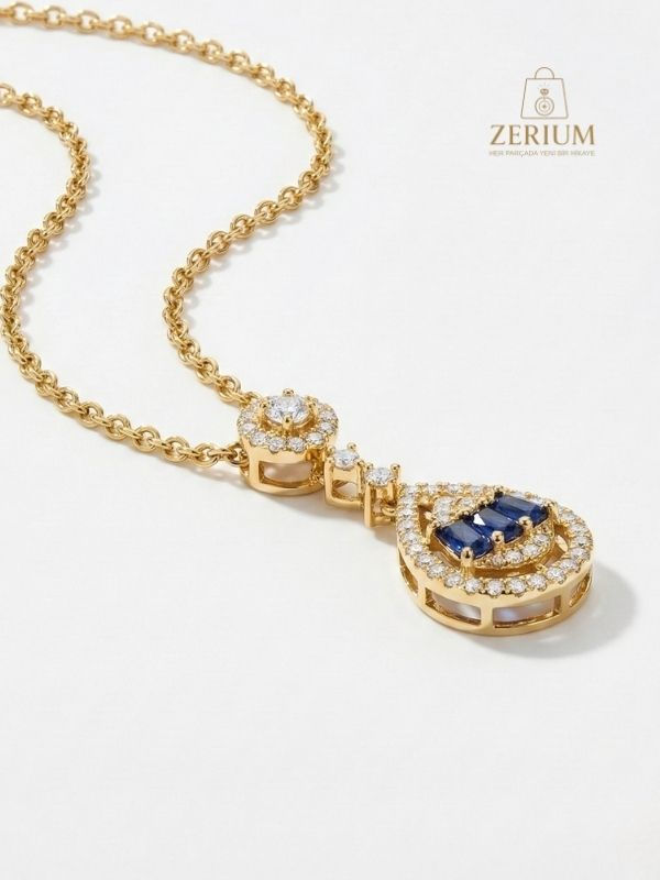 Küçük resim: Kadın Çelik Kolye Altın Renk Safir Mavisi Damla Model Elit Seri