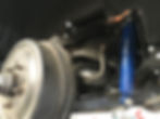 Front bags and shock relocation