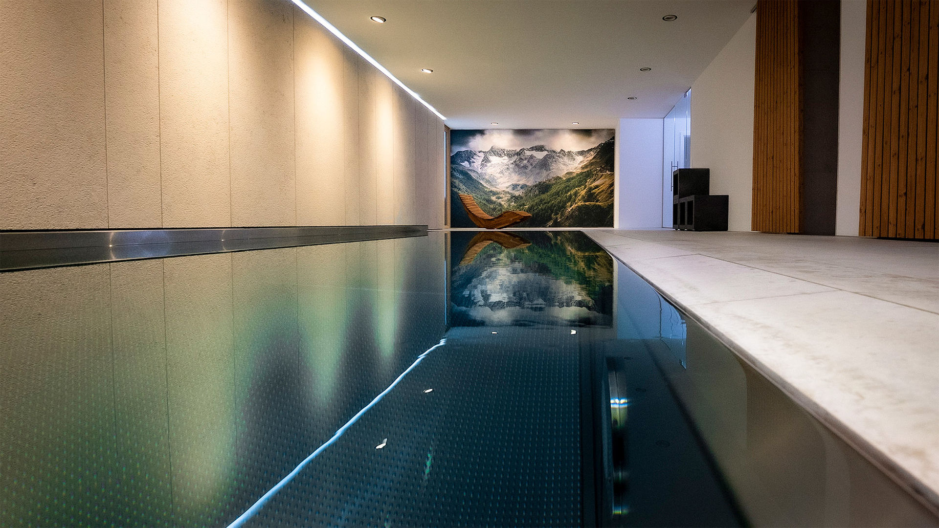 GRIMM ARCHITEKTEN BDA | Indoor-Pool, Innenpool, Natursteinpool, Edelstahlbecken, scharrierte Natursteinbekleidung, Wellness, Infinitypool