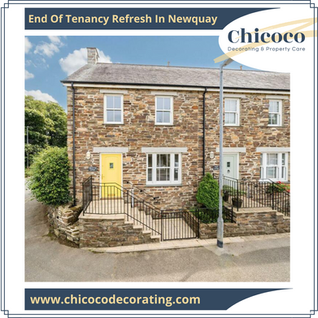 Exterior decorators in Newquay painting doors, windows and sash windows to a traditional cottage