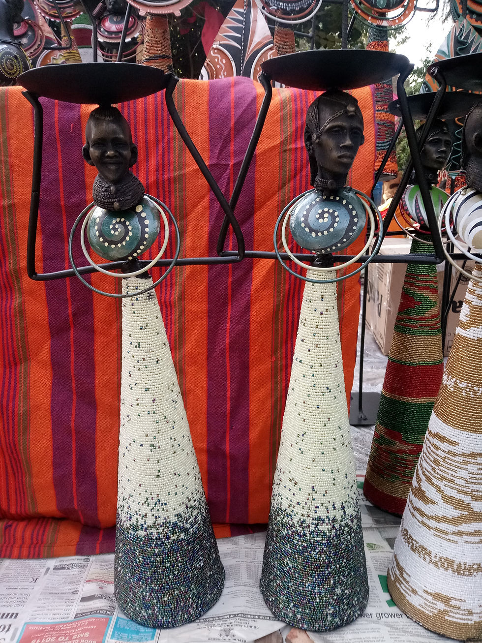 Thumbnail: beaded candle holder couple