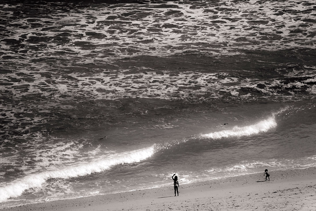 2 kids playing at the beach