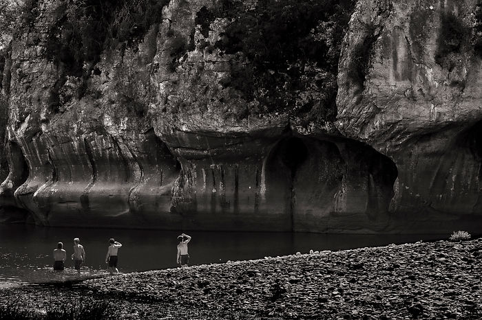 men in front of a huge mountain
