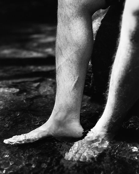 feet standing in water, wounds