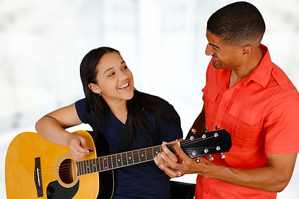 happy music student and teacher