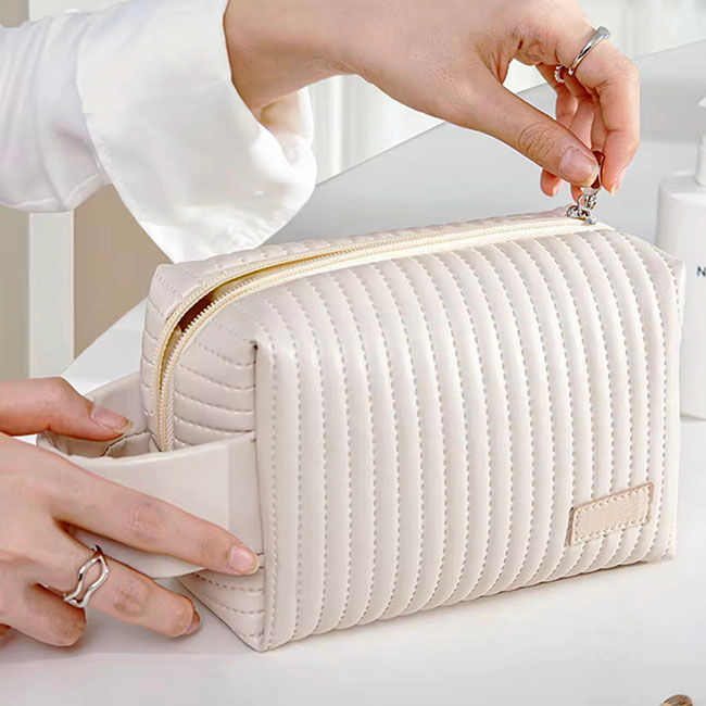 Miniatura: 50PZAS BOLSA COSMETIQUERA DE CURPIEL ASA AL COSTADO "CUMB"