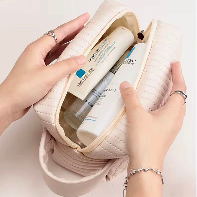 Miniatura: 50PZAS BOLSA COSMETIQUERA DE CURPIEL ASA AL COSTADO "CUMB"