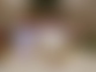 A white mug and a can of Sweet Cow ube condensed milk on a holiday-themed table with Christmas greenery.