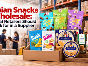 Asian snacks wholesale ad in a warehouse, with colorful wafer and cookie packs; text reads What Retailers Should Look for in a Supplier