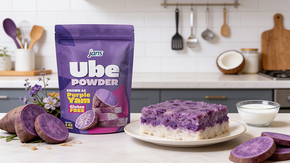 A square slice of layered purple ube biko sticky rice cake on a plate, displayed next to a purple stand-up pouch of Jans Ube Powder, fresh purple yam slices, and coconut halves on a white kitchen counter.