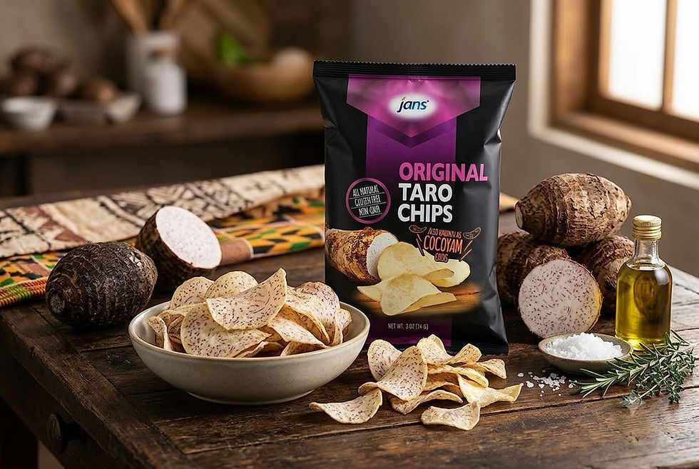 Jans Original Taro Chips bag beside bowl of chips, taro roots, salt, oil and rosemary on a rustic table in warm light