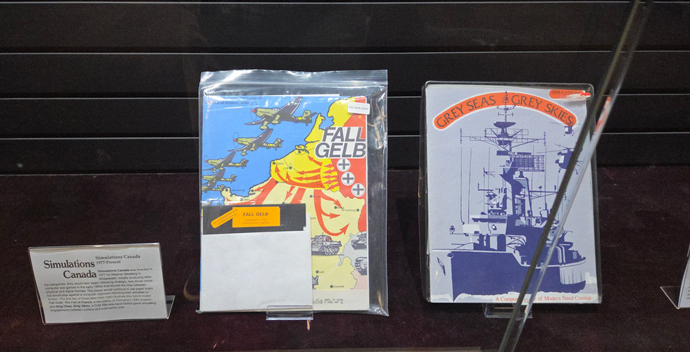 Simulations Canada was founded in 1977 by Stephen Newberg in Bridgewater. Initially producing table top wargames, they would later begin releasing strategic, text‑driven home computer war games in the early 1980s that blurred the lines between physical and digital formats. The player would continue to use paper maps but would play against a computer opponent directing their activities on screen. The first two of these titles from 1983 illustrate this hybrid model: Fall Gelb: The Fall of France, a simulation of Germany’s 1940 invasion, and Grey Seas, Grey Skies, a Cold War-era naval tactics game simulating engagements between surface and submarine units.