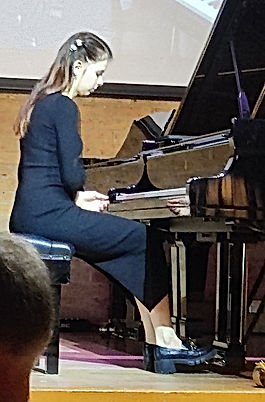 Has won 20 international piano competitions. 1st prize Chappell Medal Piano Competition and 2nd at the 2022 Birmingham International.